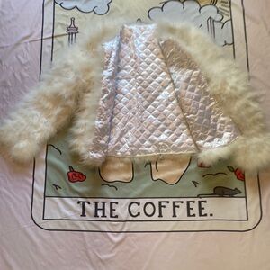 Fluffy white feather coat